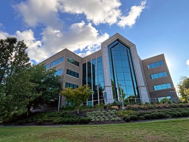 Photo of four-story building