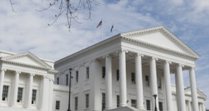 Flags wave on the roof of the State Capitol in Richmond, Va. Feb. 26, 2011. (AP Photo/Steve Helber)