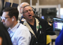 Stocks hang near their records as hopes for rate cuts underpin markets