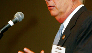 Al Broaddus, chair of the Richmond Federal Reserve Bank, delivers the keynote speech during a Chamber of Commerce event in Charlotte, N.C., Monday, Dec. 15, 2003. (AP Photo/Erik Perel)