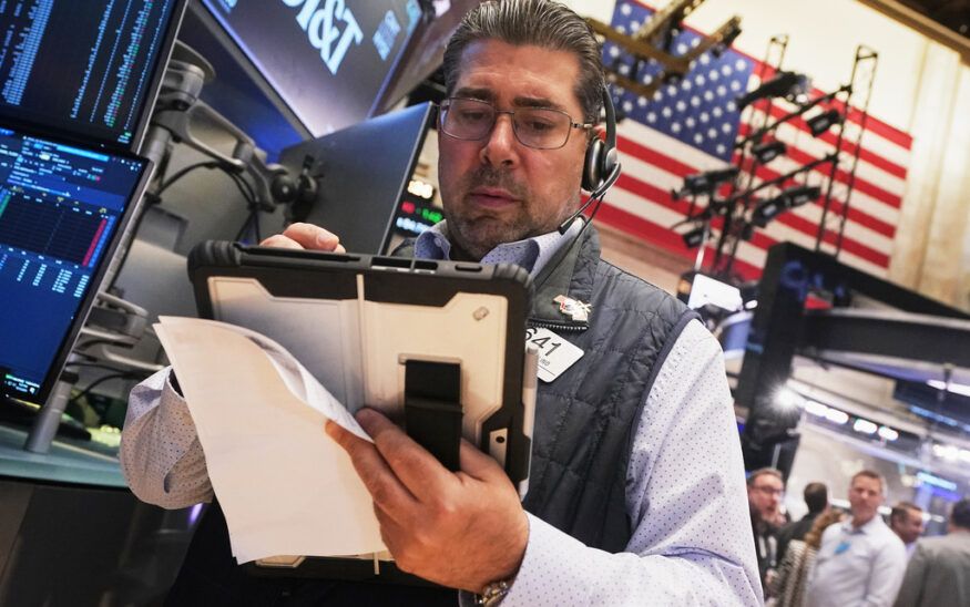 Trader Michael Capolino works on the floor of the New York Stock Exchange, Wednesday, Oct. 15, 2025. (AP Photo/Richard Drew)