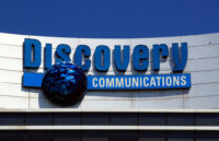 FILE - The Discovery Communications logo atop its headquarters in Silver Spring, Md, July 31, 2017. (AP Photo/Manuel Balce Ceneta, File)