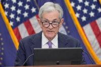 Fed cuts key rate again to support slowing economy