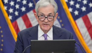 Fed cuts key rate again to support slowing economy