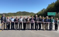 Elected officials, Virginia Department of Transportation staff, Coalfields Expressway Authority members and Bizzack Construction held a ribbon cutting Friday for part of Corridor Q. Photo courtesy VDOT.