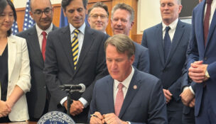 Gov. Glenn Youngkin signed on Oct. 31, 2025, a memorandum of understanding with AstraZeneca, Eli Lilly, Merck and state entities to establish a training center. Photo by Katherine Schulte/Virginia Business