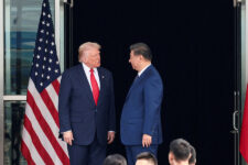 FILE PHOTO: U.S. President Donald Trump and Chinese President Xi Jinping talk as they leave after a bilateral meeting at Gimhae International Airport, on the sidelines of the Asia-Pacific Economic Cooperation summit, in Busan, South Korea, October 30, 2025. REUTERS/Evelyn Hockstein/File Photo