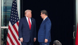FILE PHOTO: U.S. President Donald Trump and Chinese President Xi Jinping talk as they leave after a bilateral meeting at Gimhae International Airport, on the sidelines of the Asia-Pacific Economic Cooperation summit, in Busan, South Korea, October 30, 2025. REUTERS/Evelyn Hockstein/File Photo