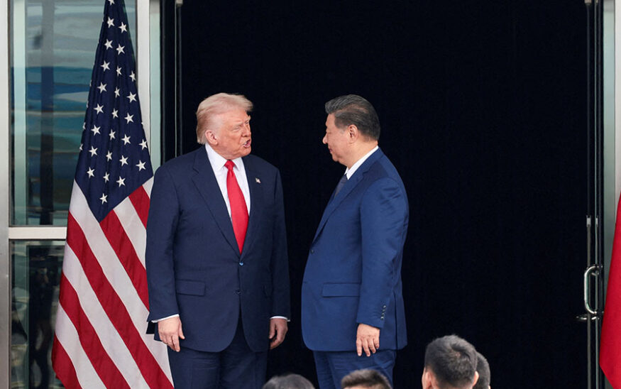 FILE PHOTO: U.S. President Donald Trump and Chinese President Xi Jinping talk as they leave after a bilateral meeting at Gimhae International Airport, on the sidelines of the Asia-Pacific Economic Cooperation summit, in Busan, South Korea, October 30, 2025. REUTERS/Evelyn Hockstein/File Photo