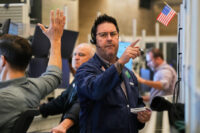 Stocks mixed as Nvidia dips after SoftBank stake sale