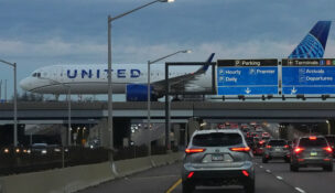 An United Airlines flight arrives at O'Hare International Airport in Chicago, Monday, Nov. 3, 2025. (AP Photo/Nam Y. Huh)