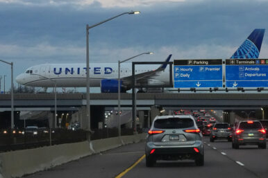 An United Airlines flight arrives at O'Hare International Airport in Chicago, Monday, Nov. 3, 2025. (AP Photo/Nam Y. Huh)