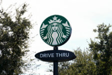 Starbucks workers kick off 65-store US strike on company’s busy Red Cup Day