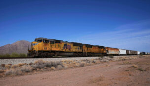 FILE - A Union Pacific freight train travels along the tracks April 17, 2025, in Eloy, Ariz. (AP Photo/Ross D. Franklin, File)