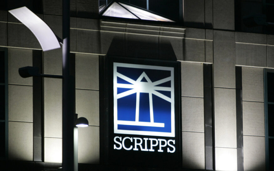 FILE - Floodlights light up the E.W. Scripps logo on the company's headquarters in Cincinnati, Jan. 31, 2006. (AP Photo/Al Behrman, File)