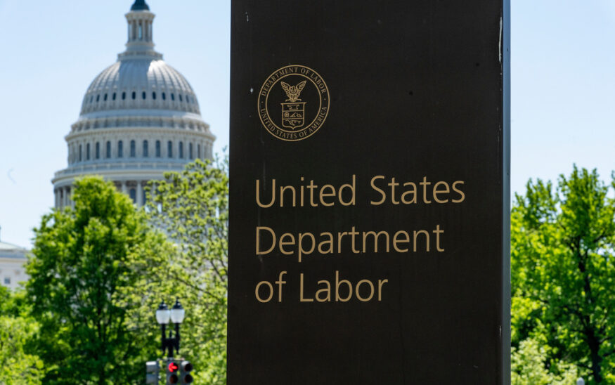 FILE - In this May 7, 2020, file photo, the entrance to the Labor Department is seen near the Capitol in Washington. (AP Photo/J. Scott Applewhite, File)