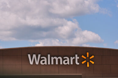 FILE - Clouds pass over the Walmart store, Thursday, Aug. 14, 2025, in Manchester, N.H. (AP Photo/Charles Krupa, File)