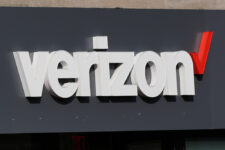 FILE - A Verizon sign is displayed on a store, Sept. 30, 2025, in Cambridge, Mass. (AP Photo/Charles Krupa, file)