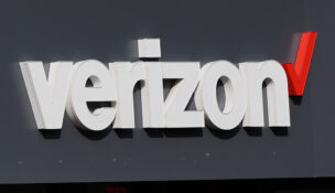 FILE - A Verizon sign is displayed on a store, Sept. 30, 2025, in Cambridge, Mass. (AP Photo/Charles Krupa, file)