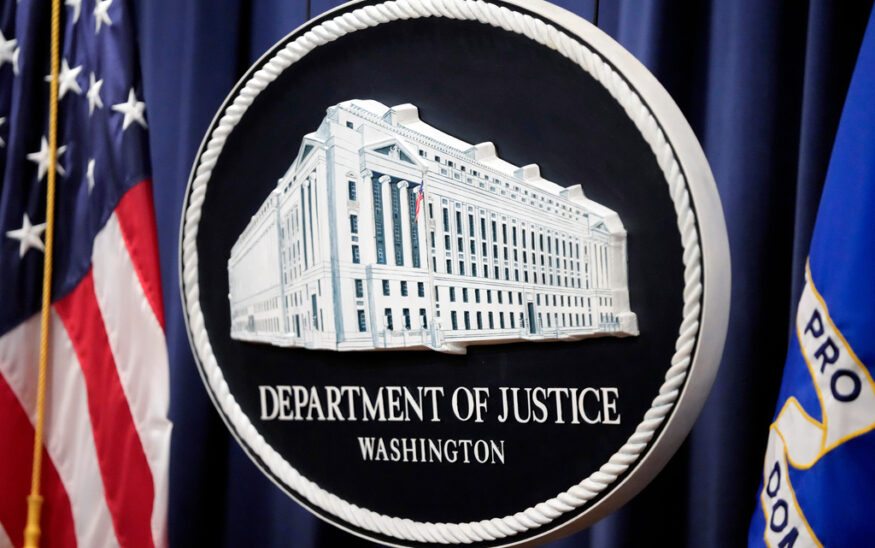 FILE - The logo for the Justice Department is seen before a news conference at the Department of Justice on Aug. 23, 2024, in Washington. (AP Photo/Mark Schiefelbein, File)