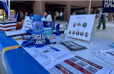 Henrico Dems table outside Henrico Western Government Center on Parham Road. Photo by Emily Grinstead/Capital News Service.