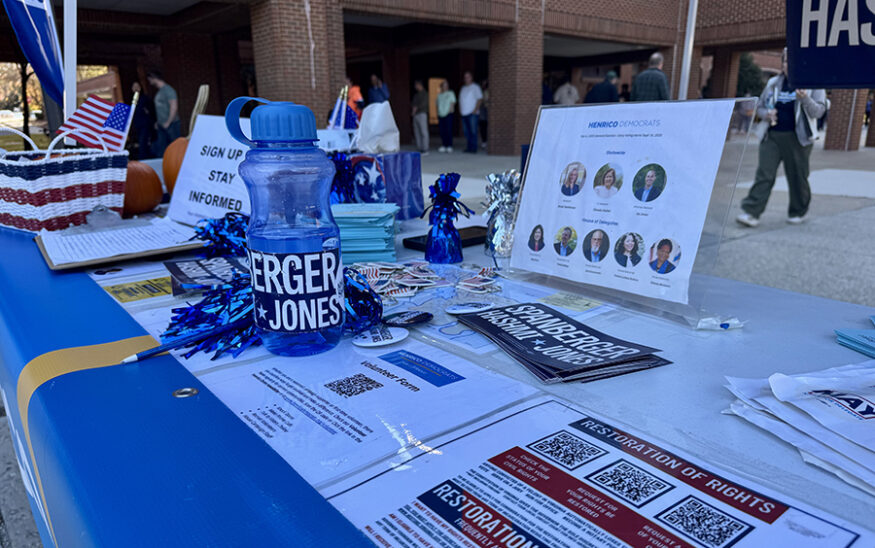 Henrico Dems table outside Henrico Western Government Center on Parham Road. Photo by Emily Grinstead/Capital News Service.