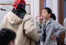 Nina Li, a member of Eastern Virginia Medical School’s Class of 2026, speaks with a patient during a health screening in Norfolk organized through Street Health, a clinical outreach initiative. Photo courtesy Macon & Joan Brock Virginia Health Sciences Eastern Virginia Medical School at Old Dominion University