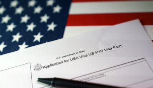 A U.S. flag and a U.S. H-1B Visa application form are seen in this illustration taken, September 22, 2025. REUTERS/Dado Ruvic/Illustration