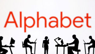 Figurines with computers and smartphones are seen in front of Alphabet logo in this illustration taken, February 19, 2024. REUTERS/Dado Ruvic/Illustration