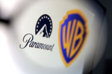 FILE PHOTO: Paramount and Warner Bros logos are seen in this illustration taken December 8, 2025. REUTERS/Dado Ruvic/Illustration/File Photo