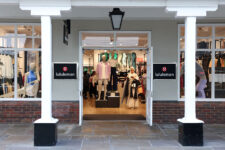 FILE PHOTO: A woman shops inside a Lululemon outlet retail store at Bicester Village in Oxfordshire, Britain, August 21, 2024. REUTERS/Hollie Adams/File Photo