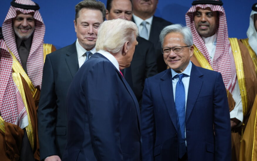 President Donald Trump speaks with Elon Musk and Nvidia CEO Jensen Huang, during the Saudi Investment Forum at the Kennedy Center, Wednesday, Nov. 19, 2025, in Washington. (AP Photo/Evan Vucci)