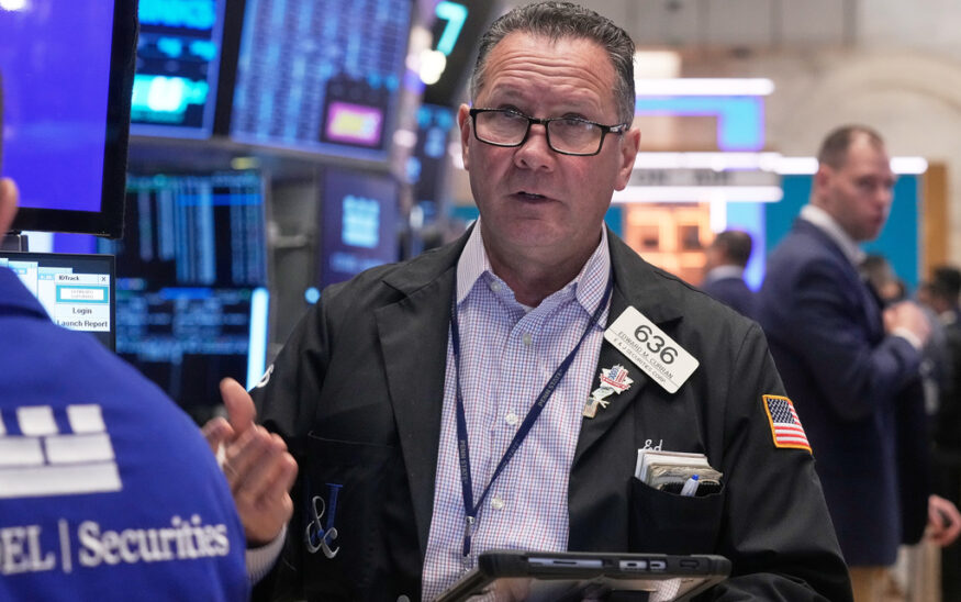 Trader Edward Curran works on the floor of the New York Stock Exchange, Monday, Nov. 24, 2025. (AP Photo/Richard Drew)