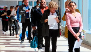 FILE - Applicants line up at a job fair at the Ocean Casino Resort in Atlantic City N.J., on April 11, 2022. (AP Photo/Wayne Parry, File)