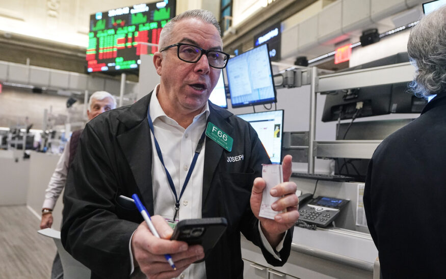 Options trader Joseph D'Arrigo works on the floor of the New York Stock Exchange, Tuesday, Dec. 2, 2025. (AP Photo/Richard Drew)