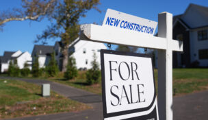 FILE - A sign is posted for a new home for sale in Ambler, Pa., Thursday, Oct. 16, 2025. (AP Photo/Matt Rourke, File)