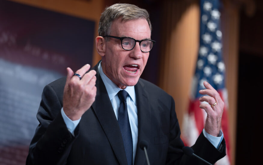 Sen. Mark Warner, D-Va., the top Democrat on the Senate Intelligence Committee, speaks about the Trump administration following reports that only Republican lawmakers received security briefings on the Trump-ordered military strikes against boats in the Caribbean, during a news conference at the Capitol in Washington, Thursday, Oct. 30, 2025. (AP Photo/J. Scott Applewhite, File)