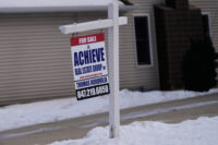 A "For Sale" sign is displayed in front of a home in Prospect Heights, Ill., Monday, Dec. 15, 2025. (AP Photo/Nam Y. Huh)