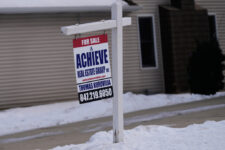 A "For Sale" sign is displayed in front of a home in Prospect Heights, Ill., Monday, Dec. 15, 2025. (AP Photo/Nam Y. Huh)
