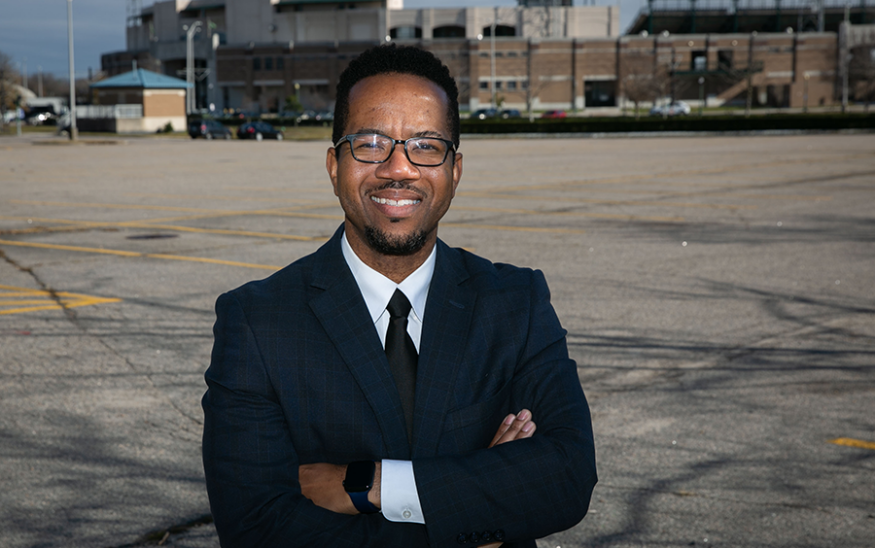 Norfolk Director of Economic Development Sean Washington stands at 101 Park Ave., one of the parcels of land the city hopes to incorporate into a entertainment district. Photo by Kristen Zeis