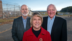 Clarke County Industrial Development Authority Chair William Waite, Clarke County Director of Economic Development & Tourism Michelle Ridings and Clarke County Board of Supervisors Chair David Weiss stand at the site of a proposed business park. Photo by Norm Shafer