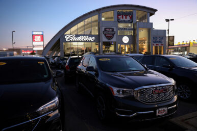 FILE PHOTO: Vehicles of automobile brands belonging to General Motors Company are seen at a car dealership in Queens, New York, U.S., November 16, 2021. REUTERS/Andrew Kelly/File Photo