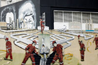 FILE PHOTO: A mural depicting oil workers of Venezuelan state oil company PDVSA is pictured near the company's headquarters, in Caracas, Venezuela May 14, 2025. REUTERS/Leonardo Fernandez Viloria/File Photo