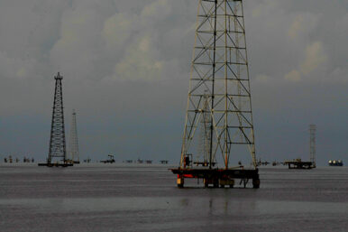 FILE PHOTO: Pumpjacks are seen at Lake Maracaibo in Cabimas, Venezuela October 5, 2017. Picture taken October 5, 2017. REUTERS/Isaac Urrutia/File Photo