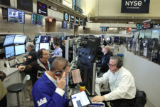 Futures-options traders work on the floor at the New York Stock Exchange's NYSE American (AMEX) in New York City, U.S., January 6, 2026. REUTERS/Brendan McDermid