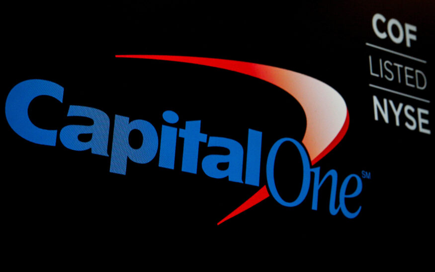The logo and ticker for Capital One are displayed on a screen on the floor of the New York Stock Exchange (NYSE) in New York, U.S., May 21, 2018. REUTERS/Brendan McDermid