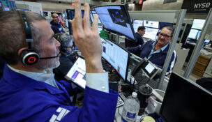 Wall Street rises as bank earnings, chip stocks rally