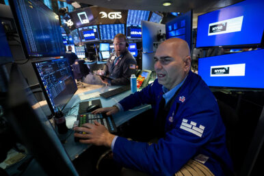 Traders work on the floor at the New York Stock Exchange (NYSE) in New York City, U.S., January 13, 2026. REUTERS/Brendan McDermid