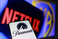 FILE PHOTO: Paramount, Netflix and Warner Bros logos are seen in this illustration taken December 8, 2025. REUTERS/Dado Ruvic/Illustration/File Photo