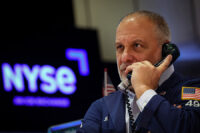 A trader works on the floor at the New York Stock Exchange (NYSE) in New York City, U.S., January 15, 2026. REUTERS/Brendan McDermid